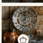 Blue-and-white plate and copper cookware